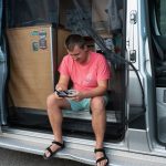 a man sitting on a bus